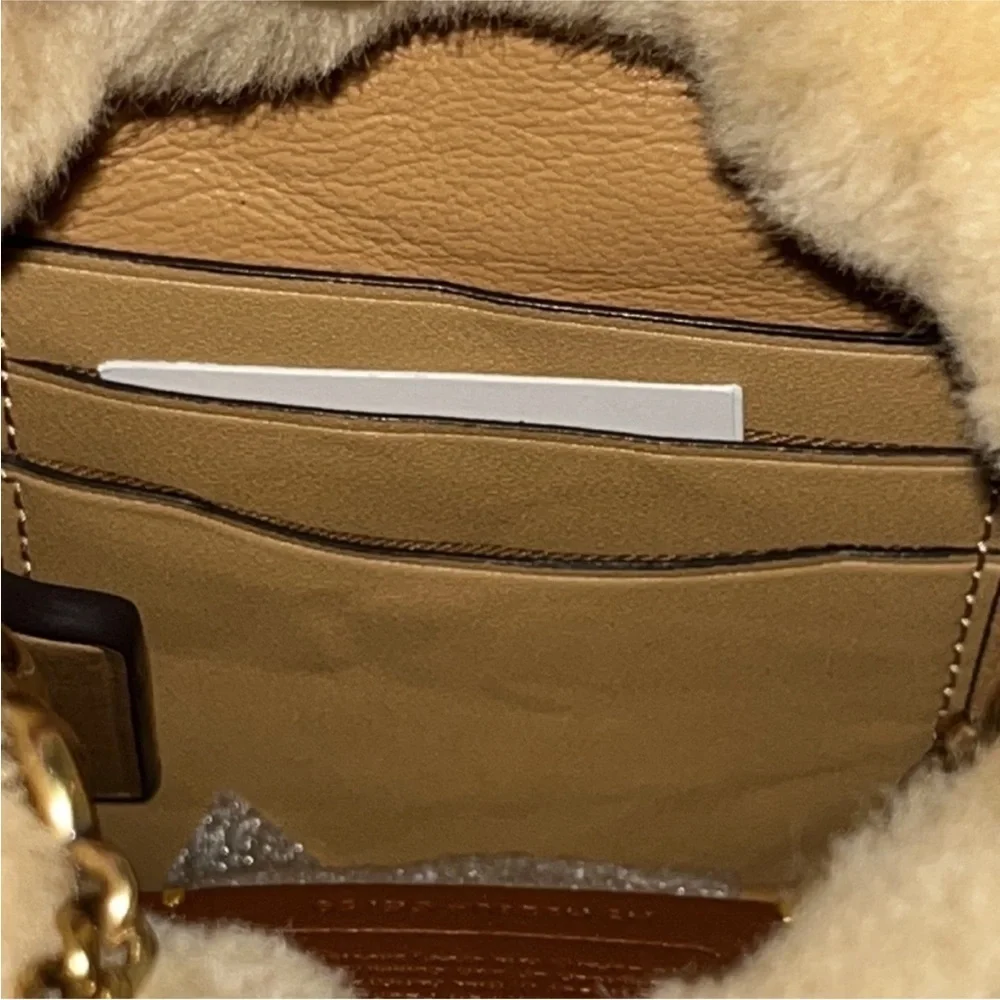 Coach natural shearling mini drawstring crossbody NWT